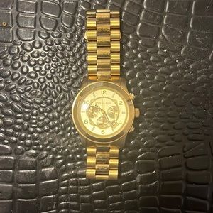 Gold MK watch